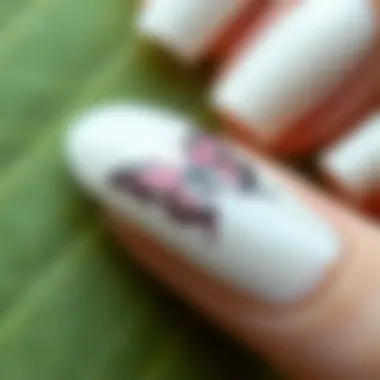 Close-up of a beautifully stamped butterfly nail design