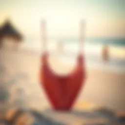 A fashionable high-waisted drawstring bikini set displayed on a sandy beach