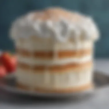 Demonstration of frosting application on a cake using a bag