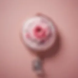 Stylish pink badge reel with a floral design