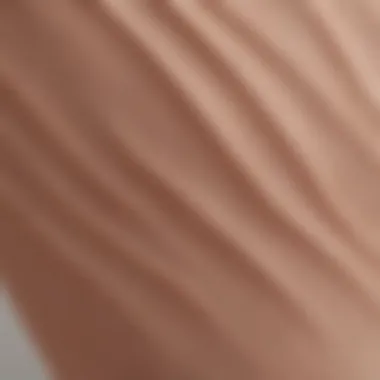 A close-up of the fabric texture of a scoop tank bodysuit