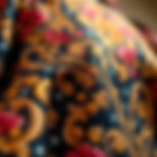 A detailed close-up of the intricate Baroque print pattern on the Versace dress, showcasing the rich colors and textures.